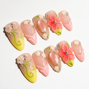 Floral Meadow press-on nails worn on hand – almond shape by Handora