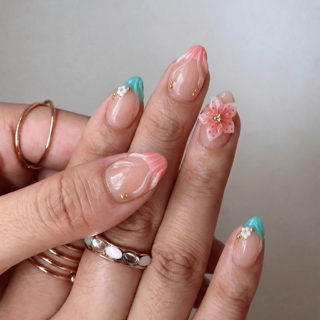 Floral Soul press-on nails worn on hand – almond shape by Handora