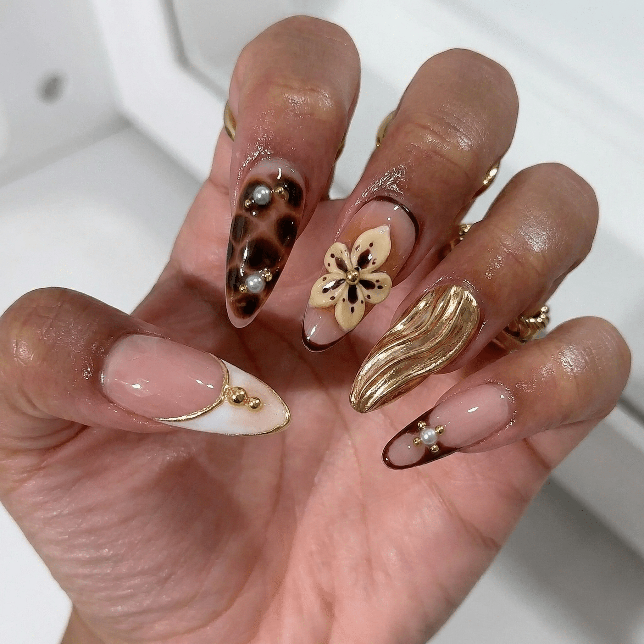 Floral Tortoise press-on nails – hand-painted reusable gel set by Handora