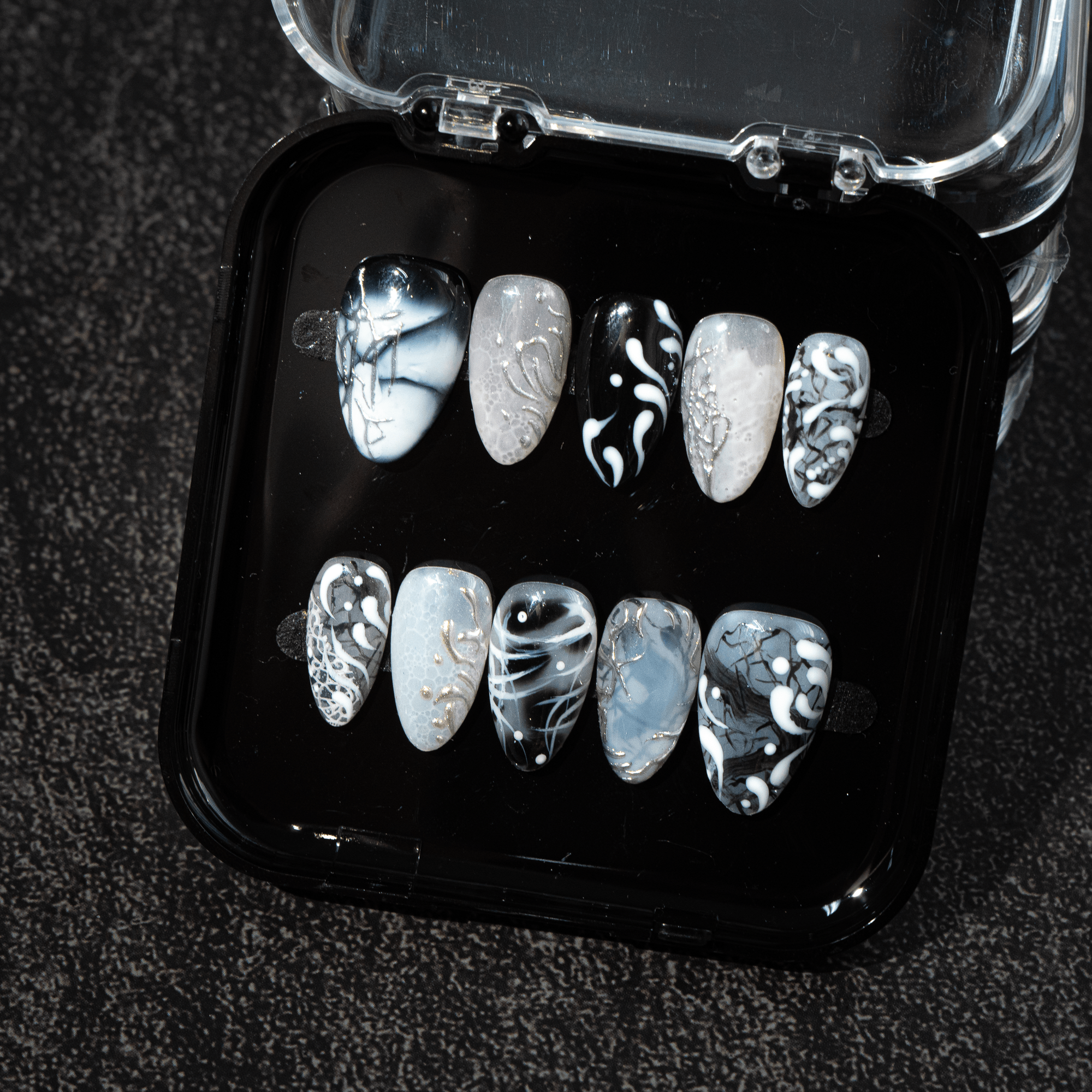 Fluid Ink press-on nails – hand-painted reusable gel set by Handora