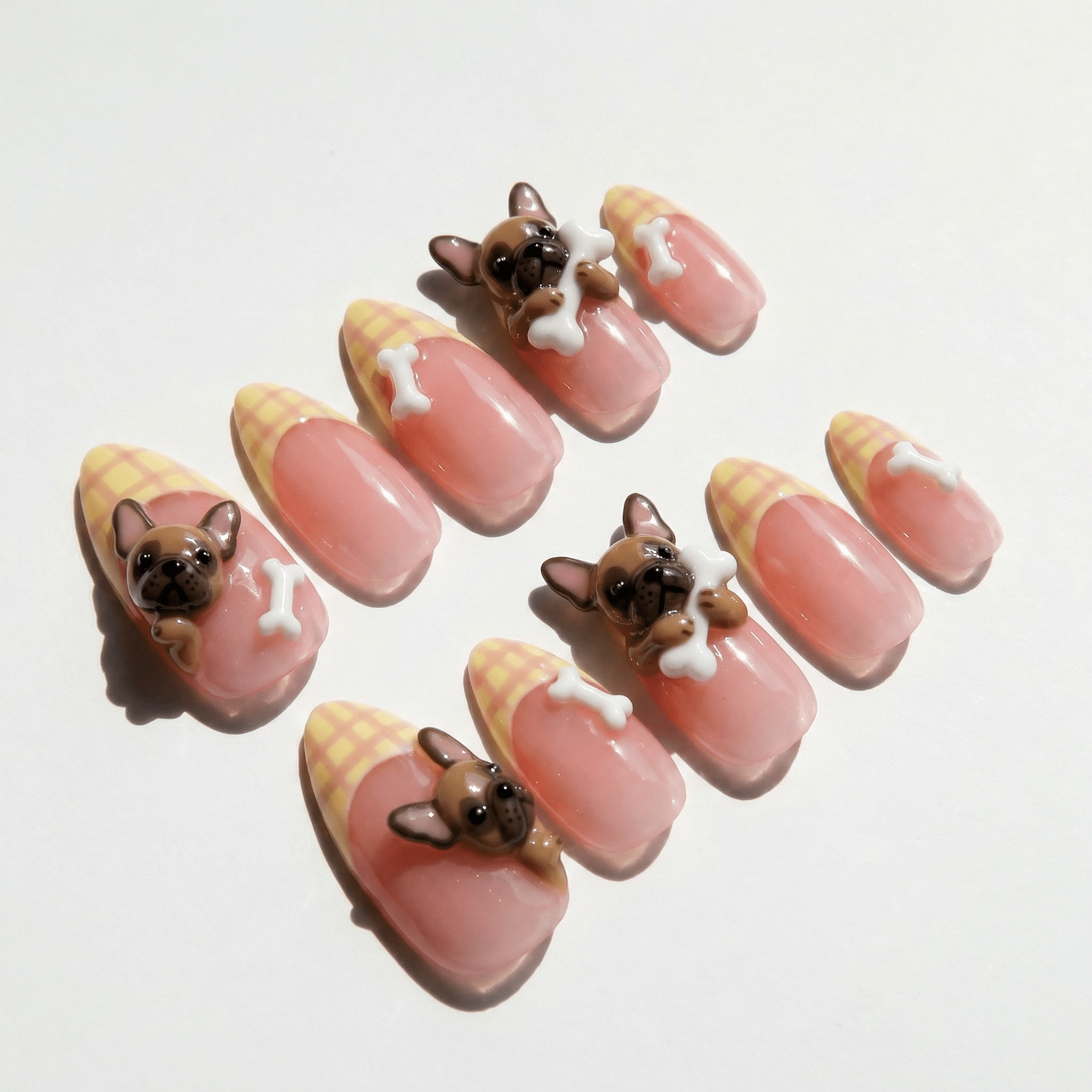 Frenchie Plaid press-on nails worn on hand – almond shape by Handora