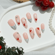 Frost Kiss oval christmas press-on nails by Handora