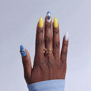 Fruit Sorbet press-on nails worn on hand – almond shape by Handora