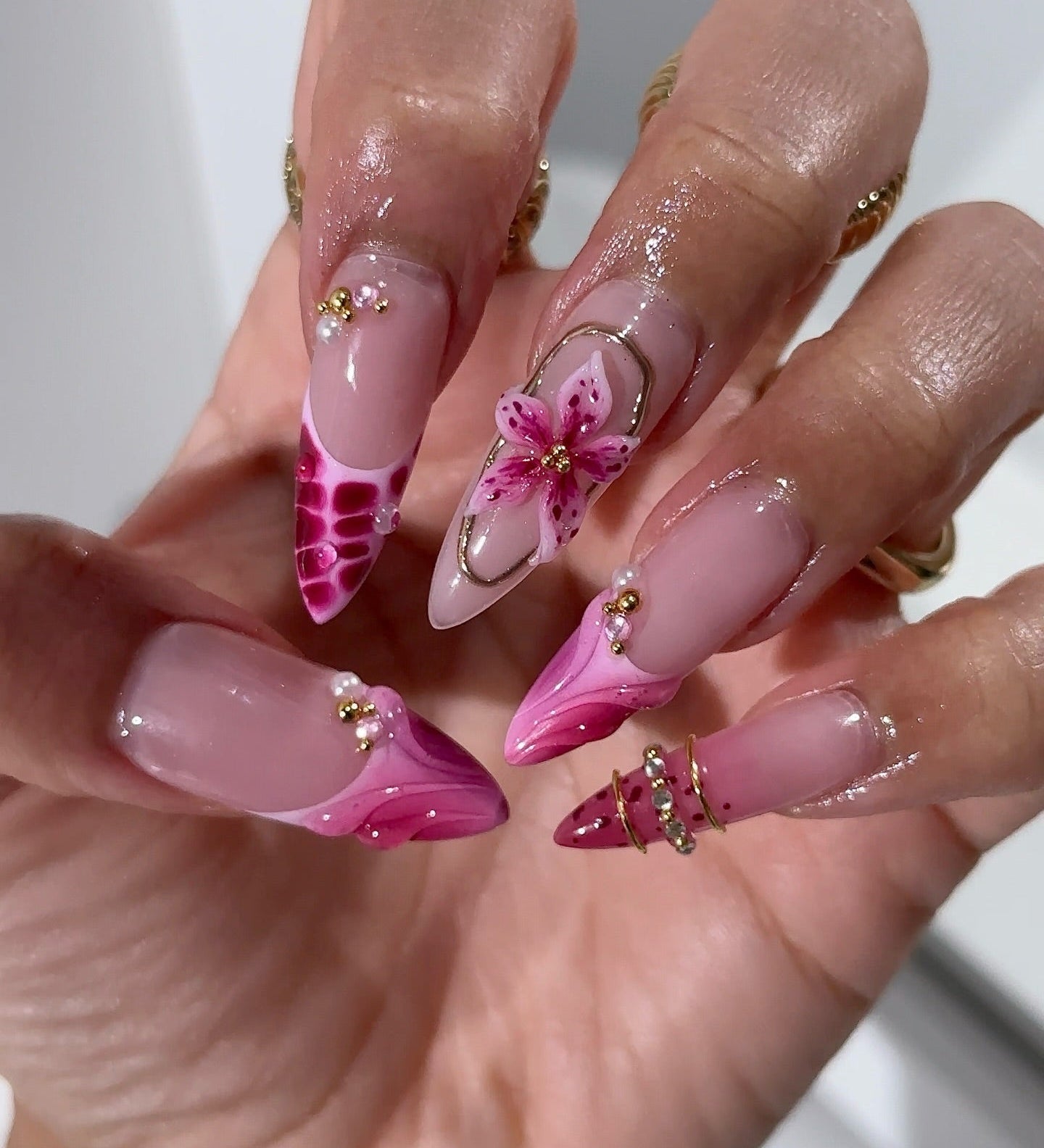 Fuchsia Flora press-on nails – hand-painted reusable gel set by Handora
