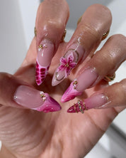 Fuchsia Flora press-on nails – hand-painted reusable gel set by Handora