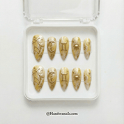 Gemini Glaze press-on nails worn on hand – almond shape by Handora