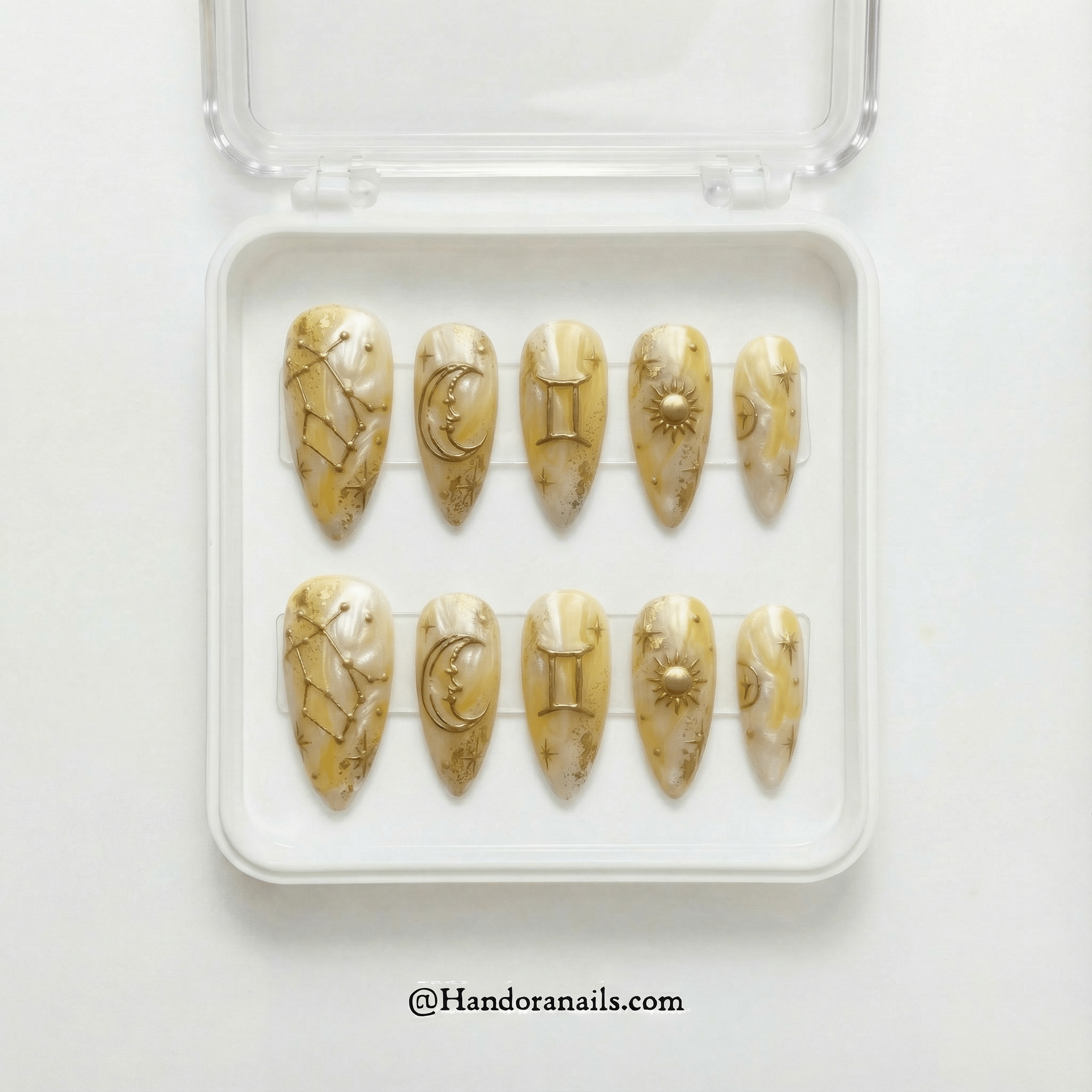 Gemini Glaze press-on nails worn on hand – almond shape by Handora