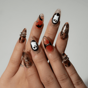Ghost Night press-on nails worn on hand – almond shape by Handora