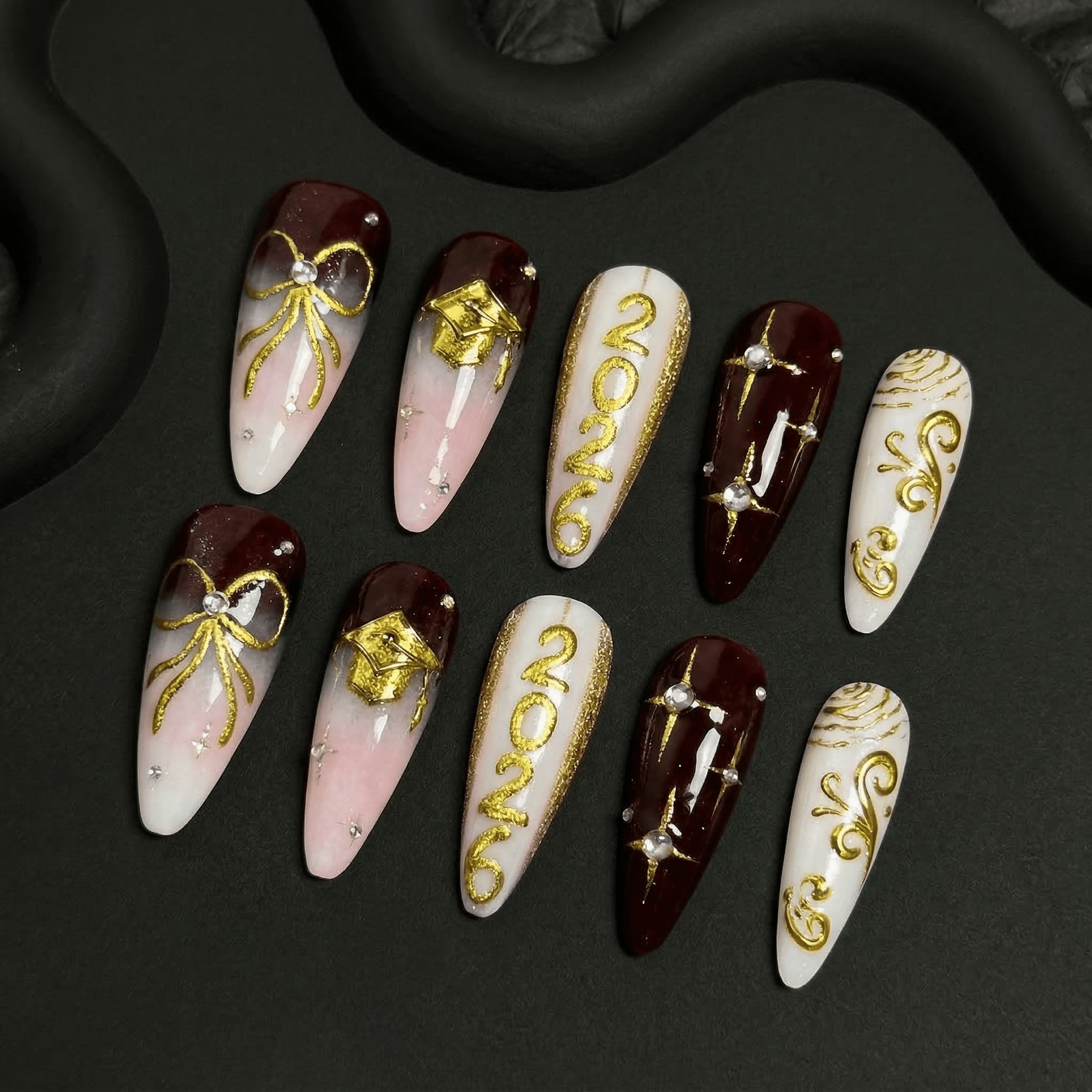 Gilded Graduate press-on nails – design close-up by Handora