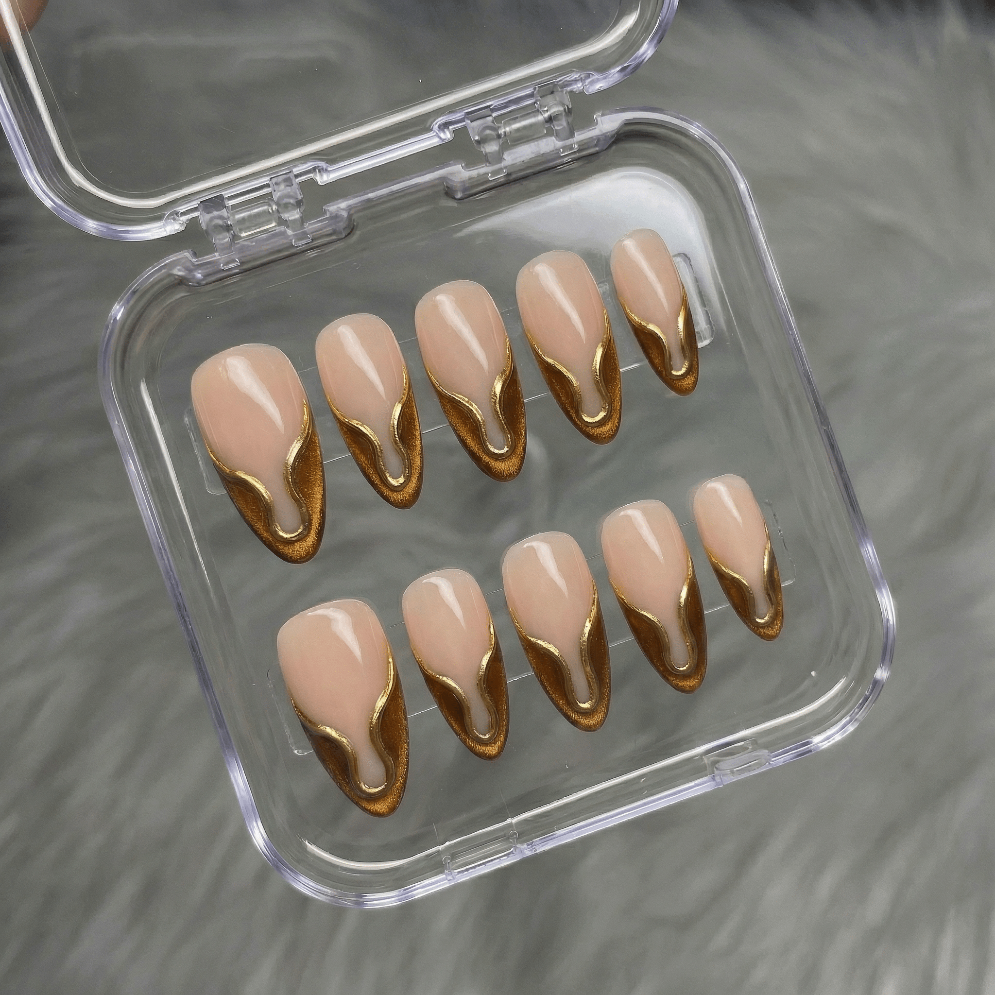 Gilded Onyx press-on nails by Handora