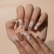 Gilded Petals floral nail design – handmade press-on nails by Handora