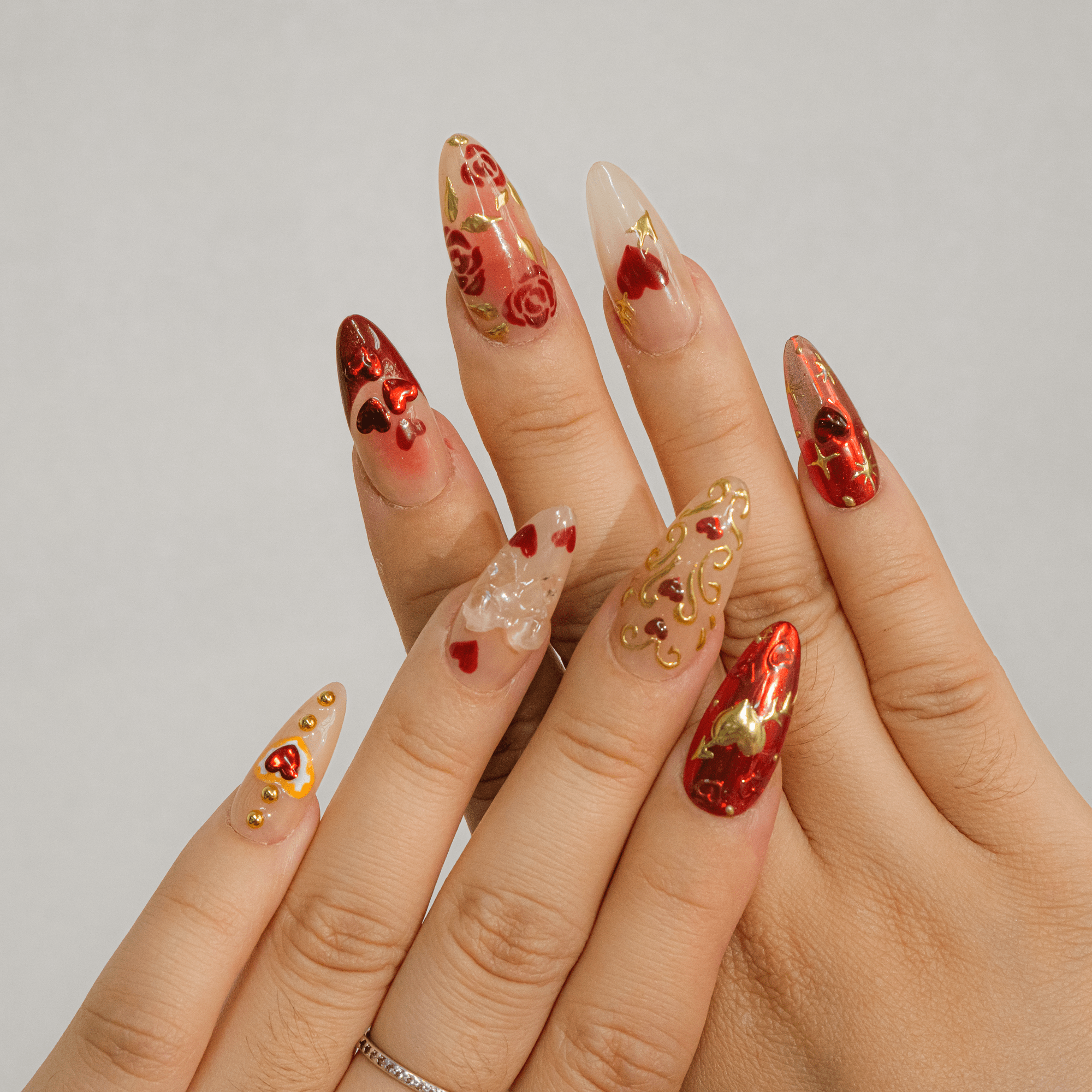 Gilded Romance almond press-on nails – design close-up by Handora