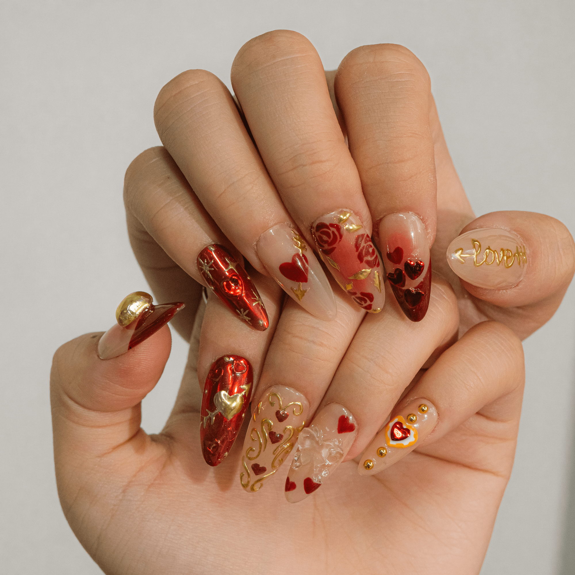 Gilded Romance press-on nails – hand-painted reusable gel set by Handora