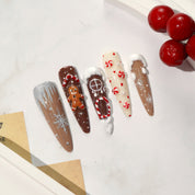Ginger Dream press-on nails worn on hand – stiletto shape by Handora