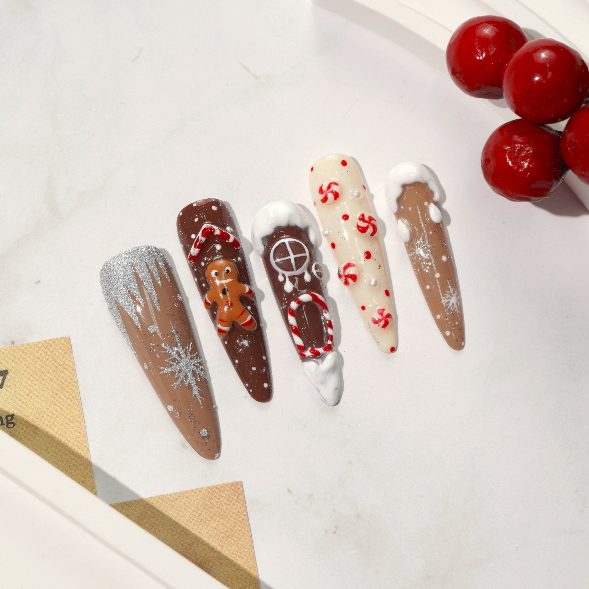 Ginger Dream press-on nails worn on hand – stiletto shape by Handora