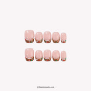 Ginger Snap Christmas press-on nails - white background by Handora Nails