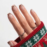 Ginger Snap Christmas press-on nails - moving hand by Handora Nails