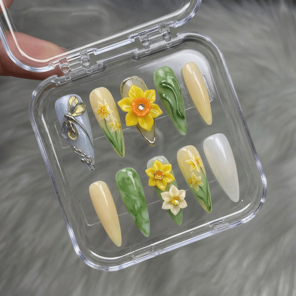 Golden Dragonfly press-on nails worn on hand – almond shape by Handora