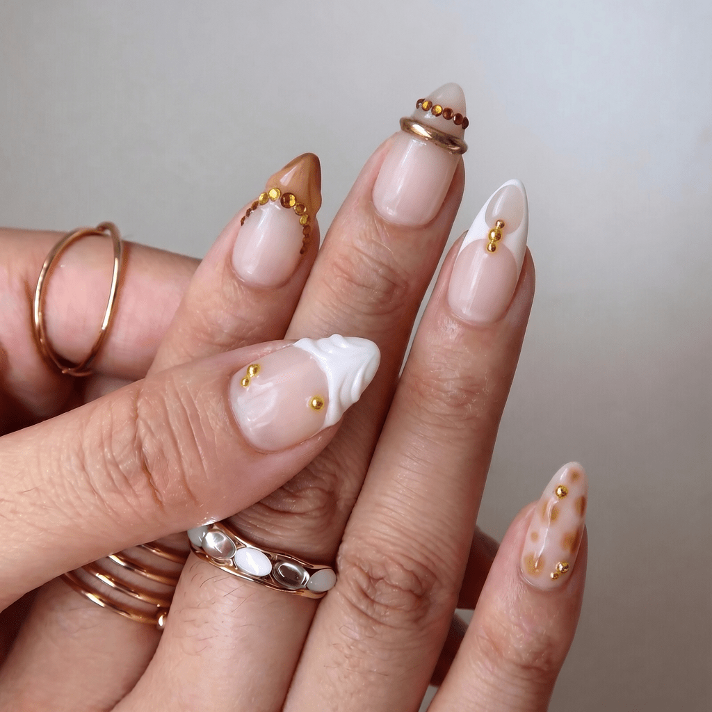 Golden Leopard press-on nails worn on hand – almond shape by Handora