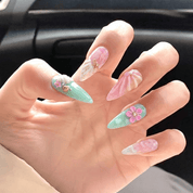 Golden Mermaid press-on nails worn on hand – stiletto shape by Handora