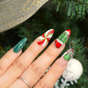 Green Xmas press-on nails – hand-painted reusable gel set by Handora