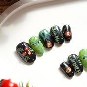 Grinchmas press-on nails worn on hand – square shape by Handora