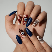 Haunted Eyes press-on nails – hand-painted reusable gel set by Handora