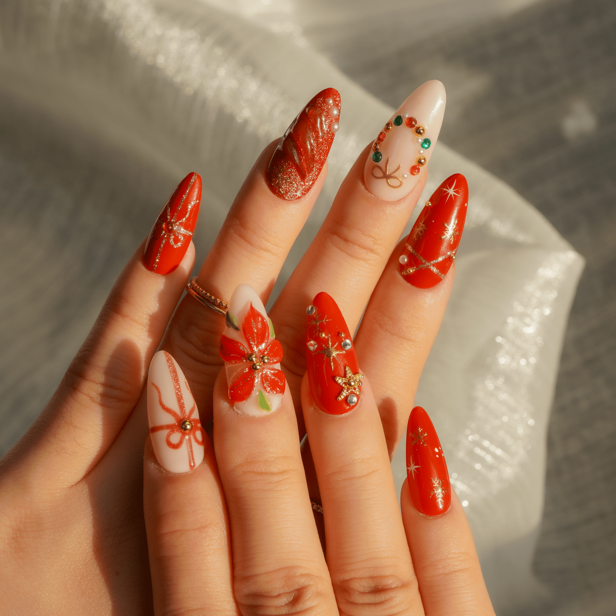 Holiday Bloom press-on nails – hand-painted reusable gel set by Handora