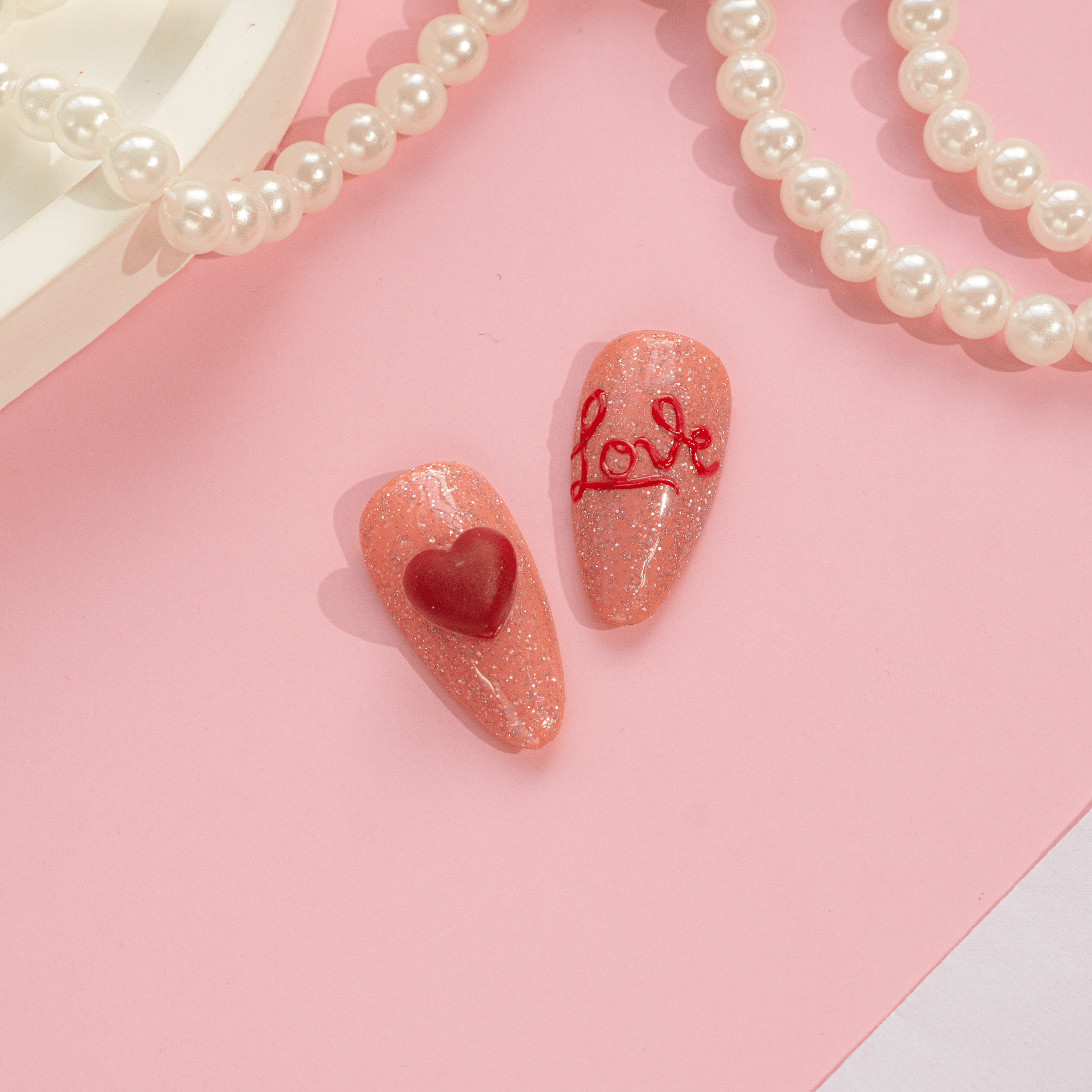 Honey Teddy press-on nails worn on hand – almond shape by Handora