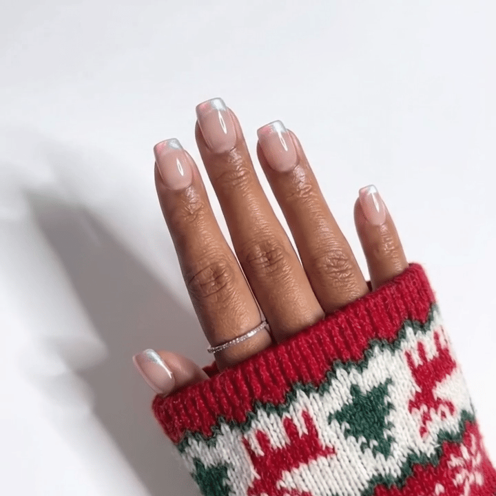 Icy Mirage Christmas press-on nails - moving hand by Handora Nails
