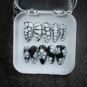 Ink Petals press-on nails – hand-painted reusable gel set by Handora