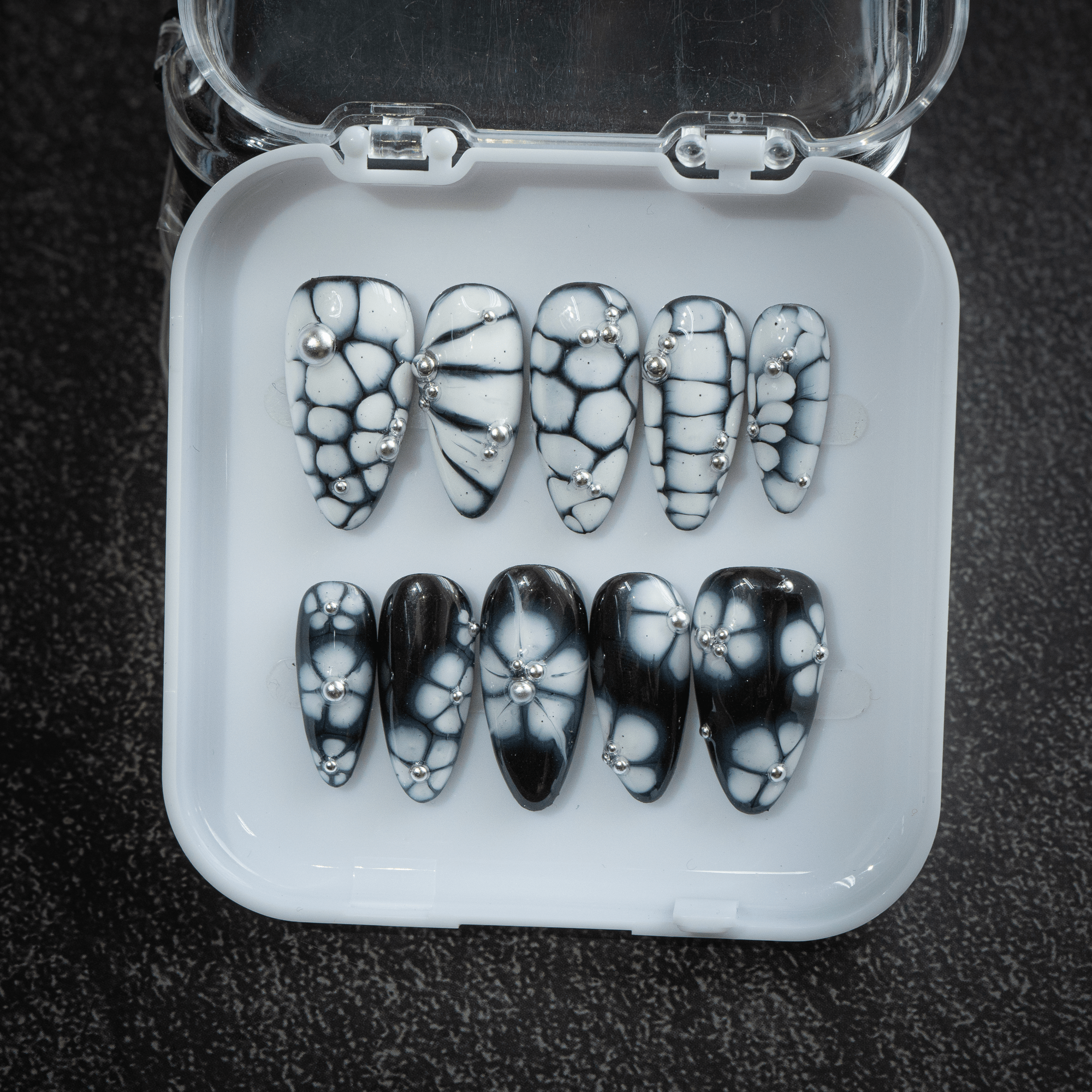 Ink Petals press-on nails – hand-painted reusable gel set by Handora