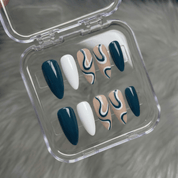 Jade Wave press-on nails worn on hand – almond shape by Handora