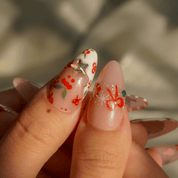 Jolly Joy almond press-on nails – design close-up by Handora