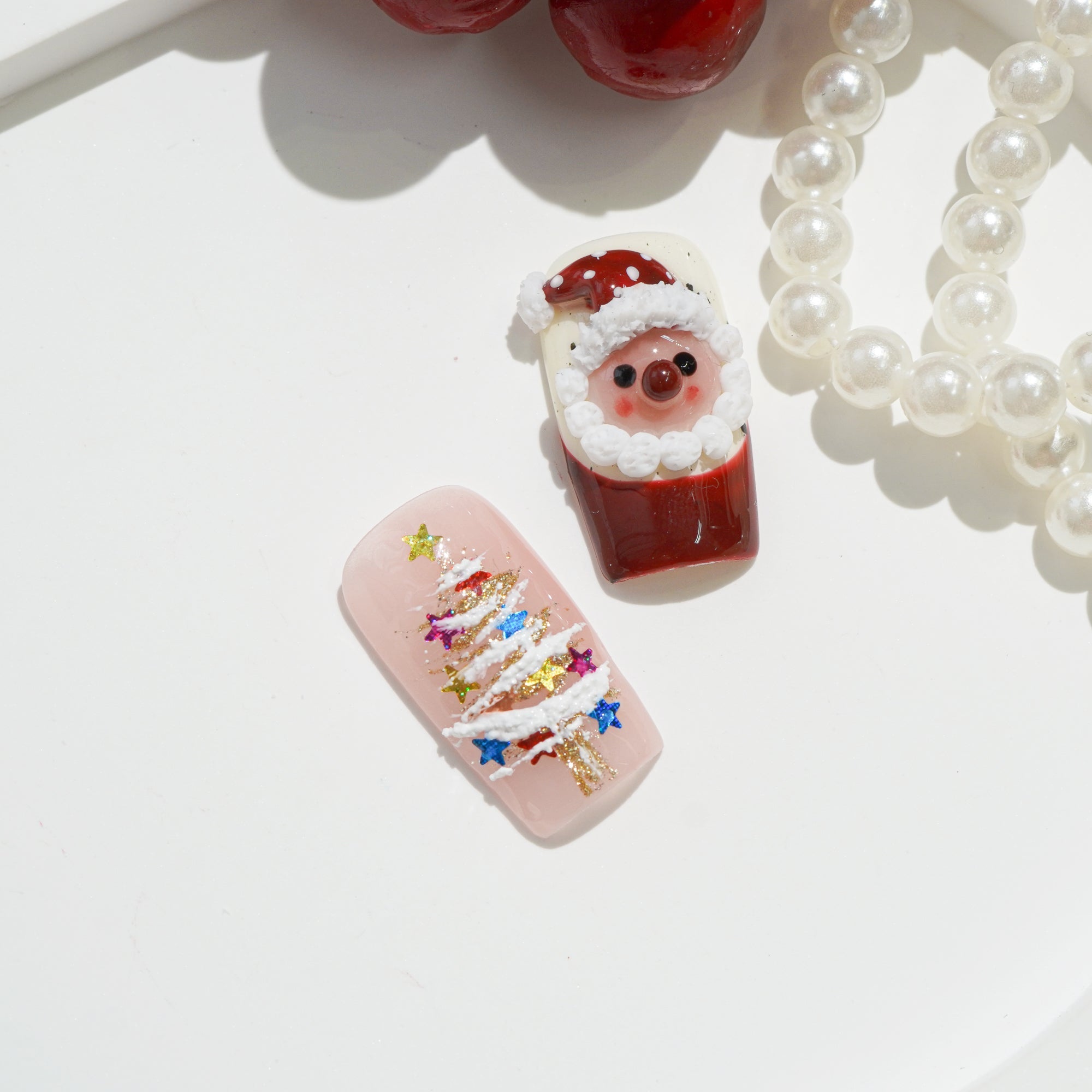 Jolly Red press-on nails – hand-painted reusable gel set by Handora