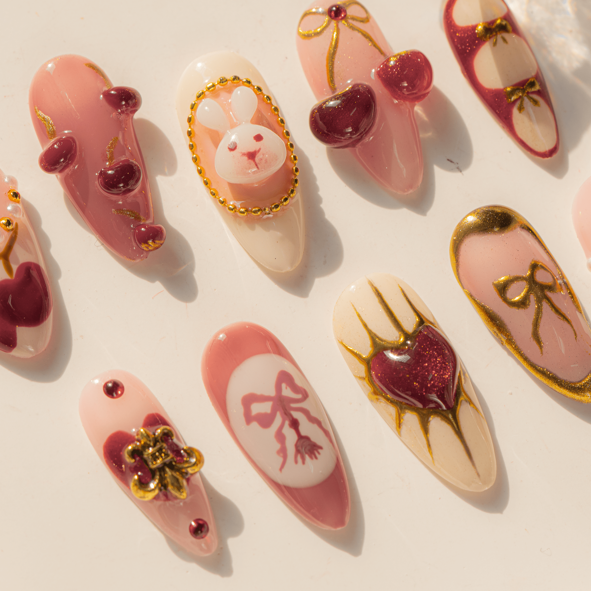 Kawaii Coquette press-on nails – hand-painted reusable gel set by Handora