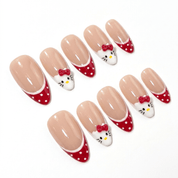 Kawaii Kitty press-on nails worn on hand – almond shape by Handora