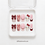 Kitty Coquette press-on nails – design close-up by Handora