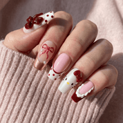Kitty Coquette press-on nails – hand-painted reusable gel set by Handora