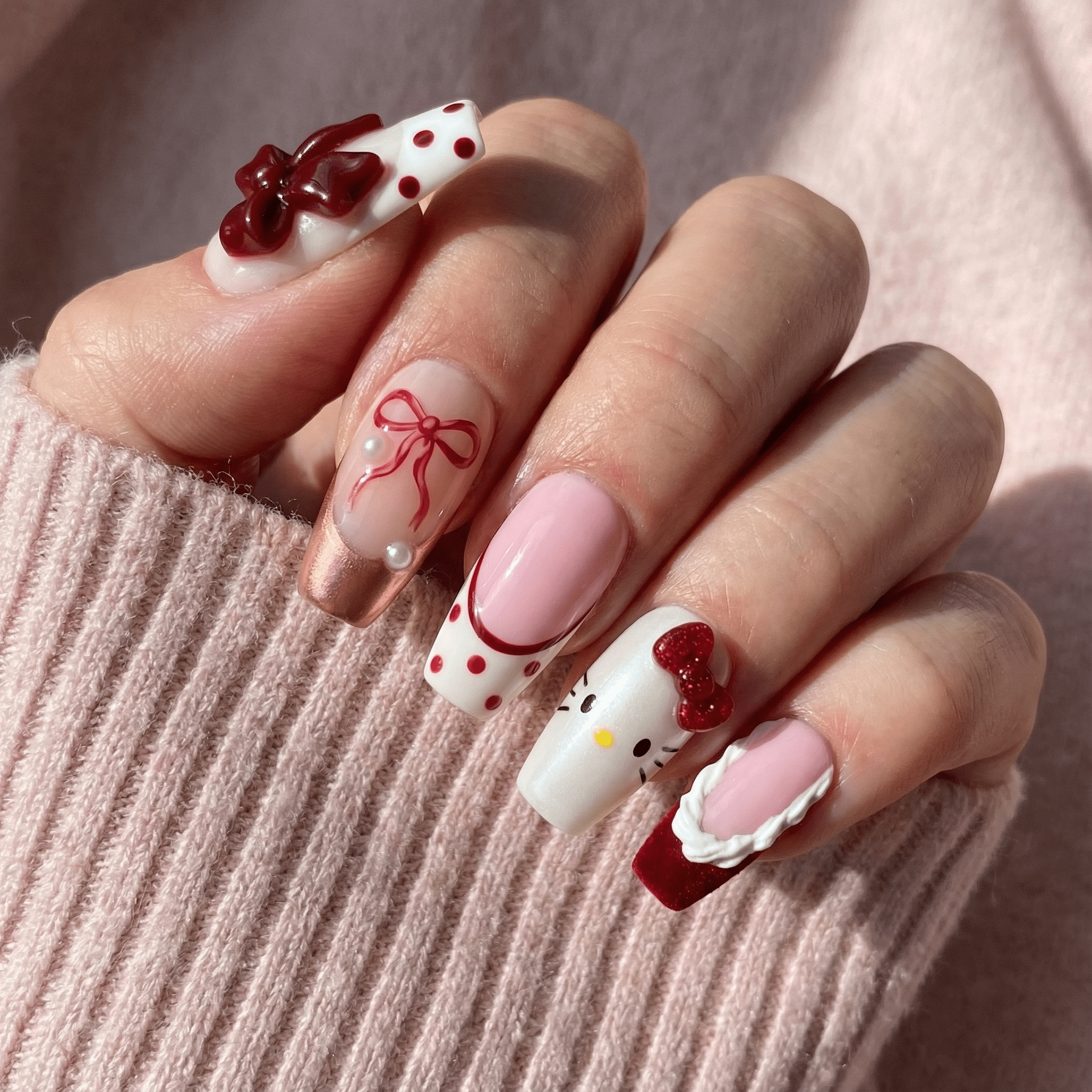 Kitty Coquette press-on nails – hand-painted reusable gel set by Handora