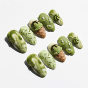 Kiwi Sundae press-on nails worn on hand – almond shape by Handora