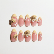 Labrador Charm press-on nails worn on hand – almond shape by Handora