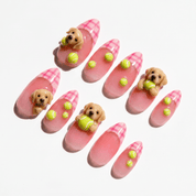Labrador Fetch press-on nails worn on hand – almond shape by Handora