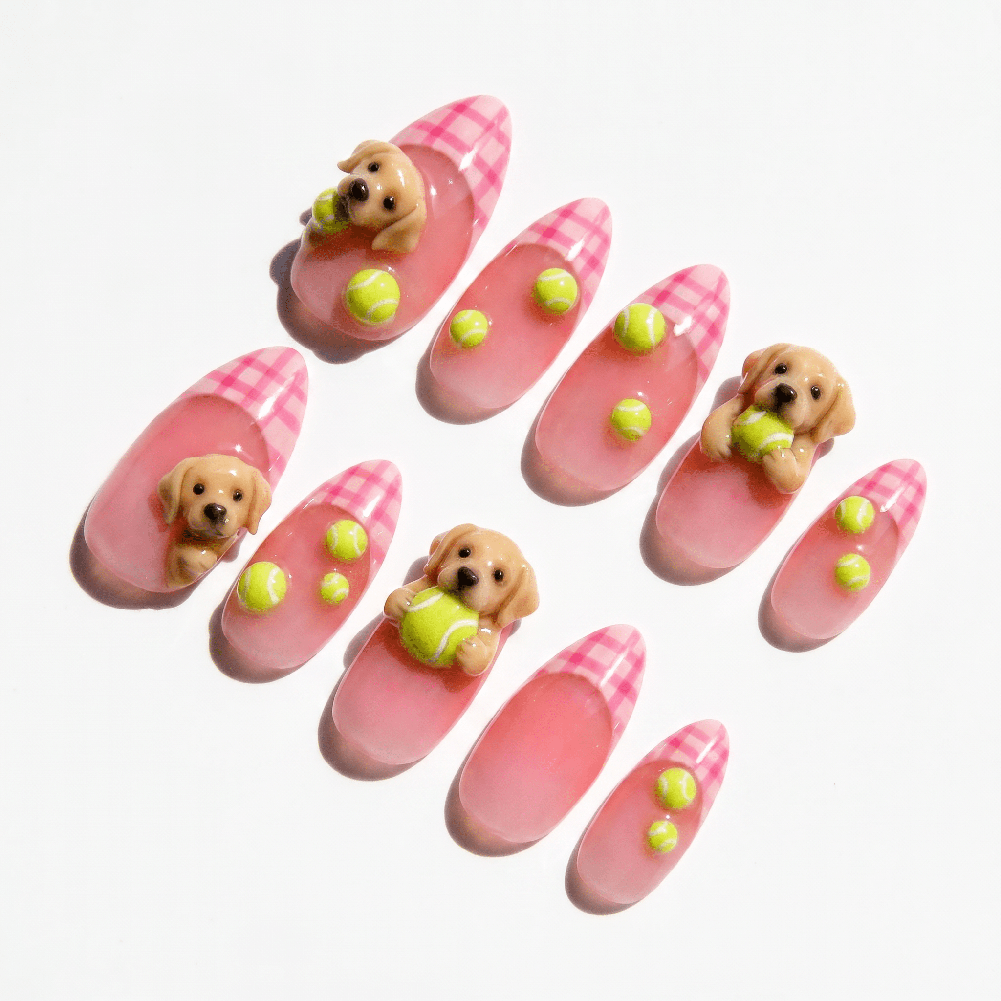 Labrador Fetch press-on nails worn on hand – almond shape by Handora