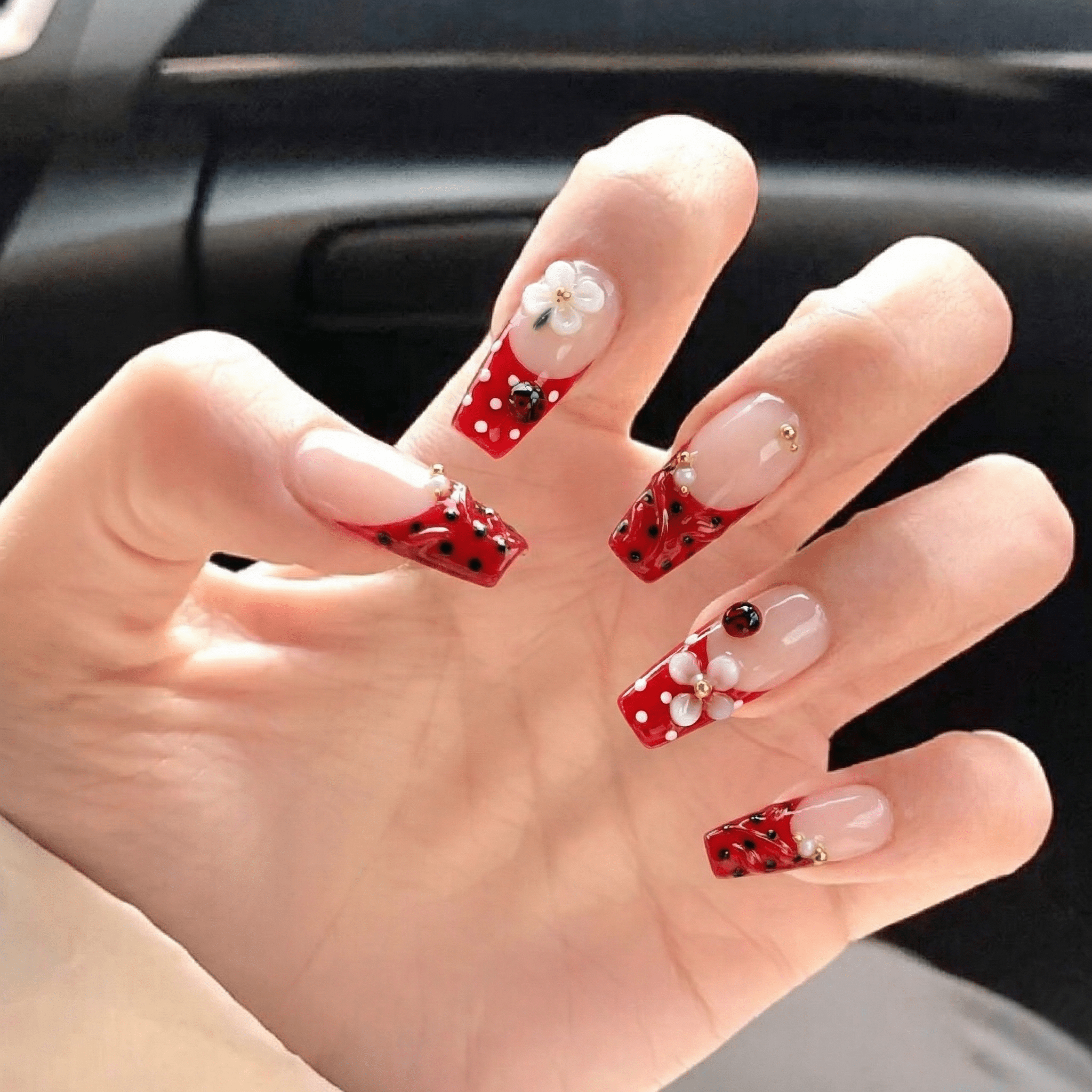 Ladybug Blossom coffin press-on nails – design close-up by Handora