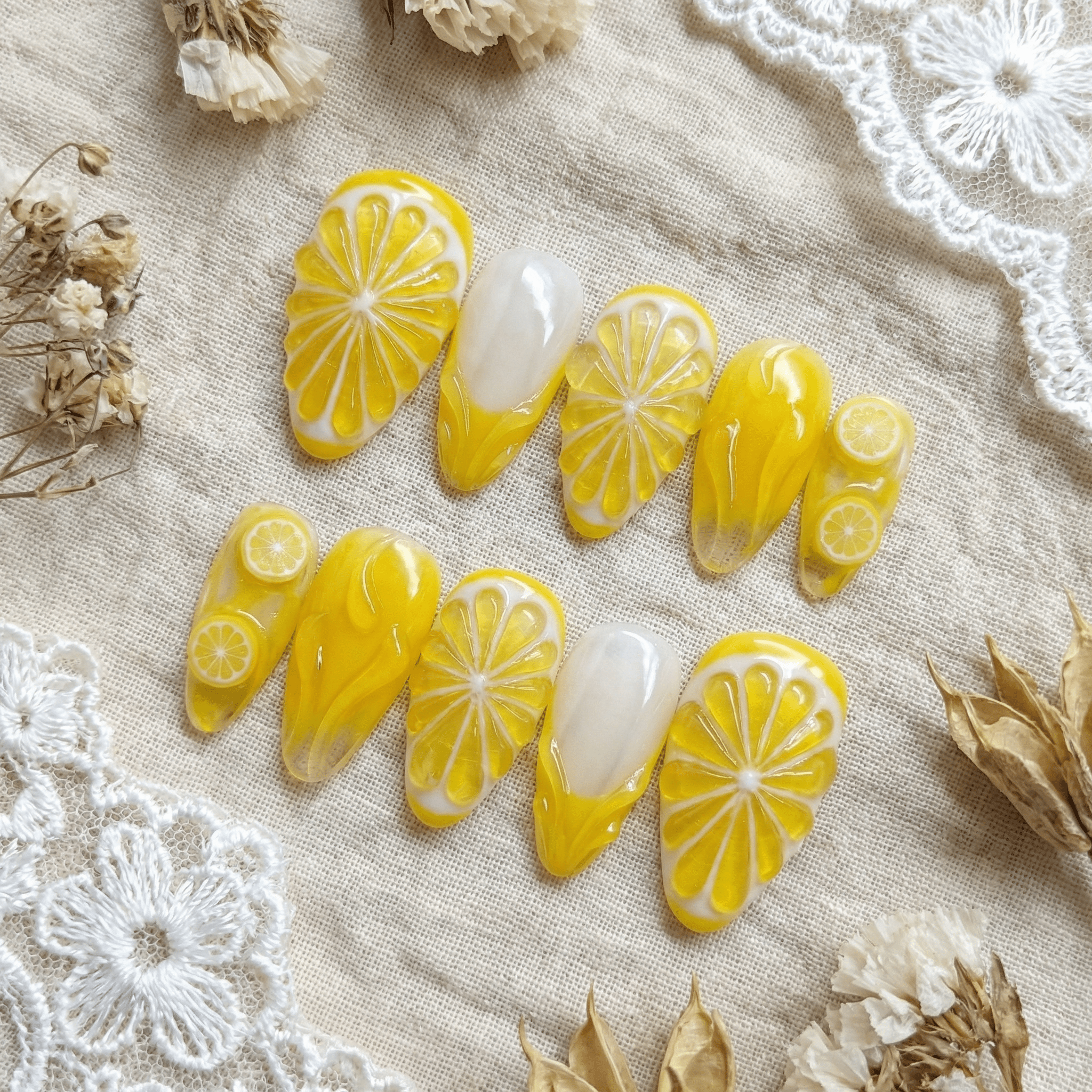 Lemon Glow press-on nails by Handora