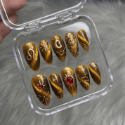 Leo Royal press-on nails worn on hand – almond shape by Handora