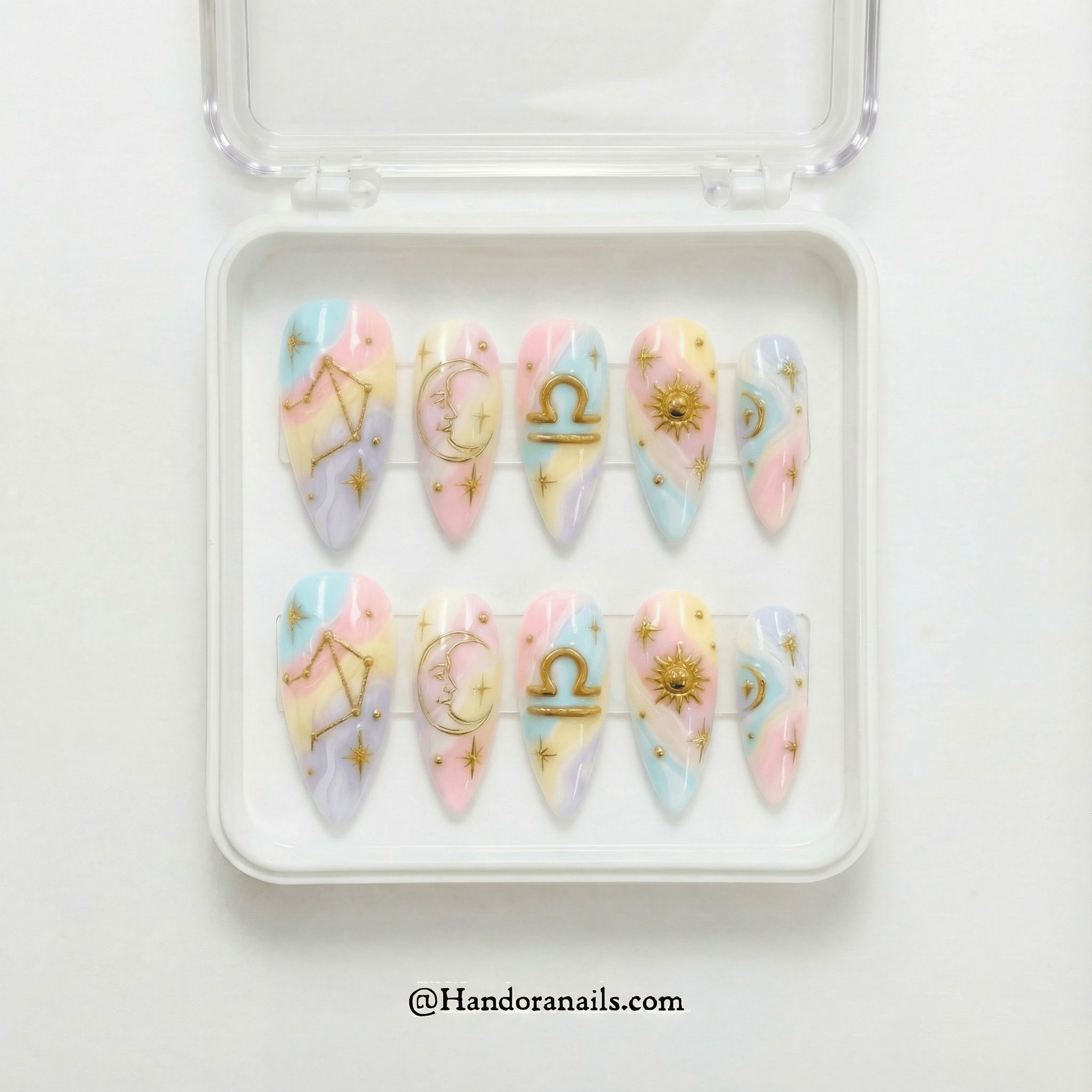 Libra Ethereal press-on nails worn on hand – almond shape by Handora