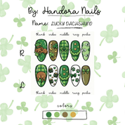 Lucky Dachshund press-on nails worn on hand – almond shape by Handora