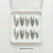 Lunar Cancer press-on nails worn on hand – almond shape by Handora